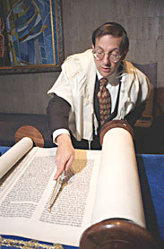 Rabbi reading the Torah